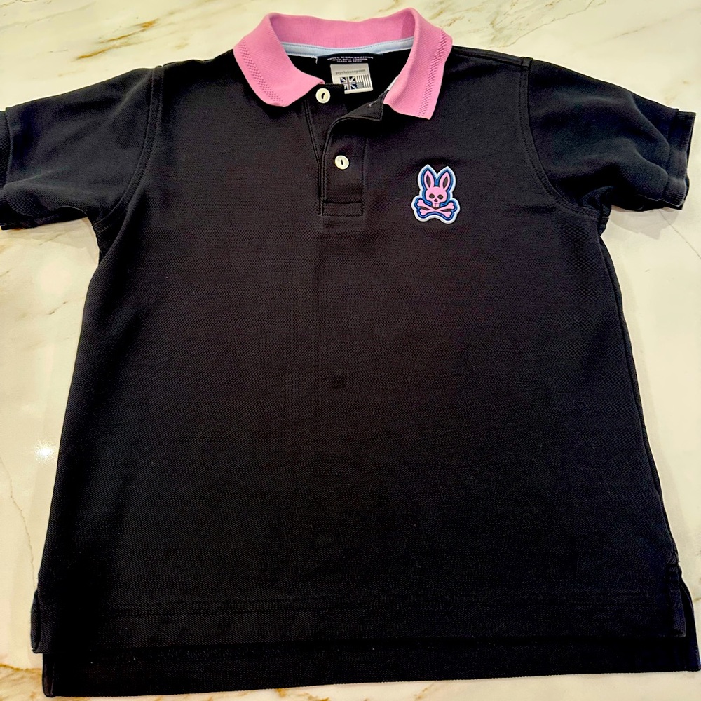 Psycho Bunny boys polo black polo shirt with lavender accents. Size small 7/8.